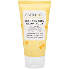 Farmacy Honeymoon Glow Body bottle close-up showing a hydrating exfoliant for dry skin