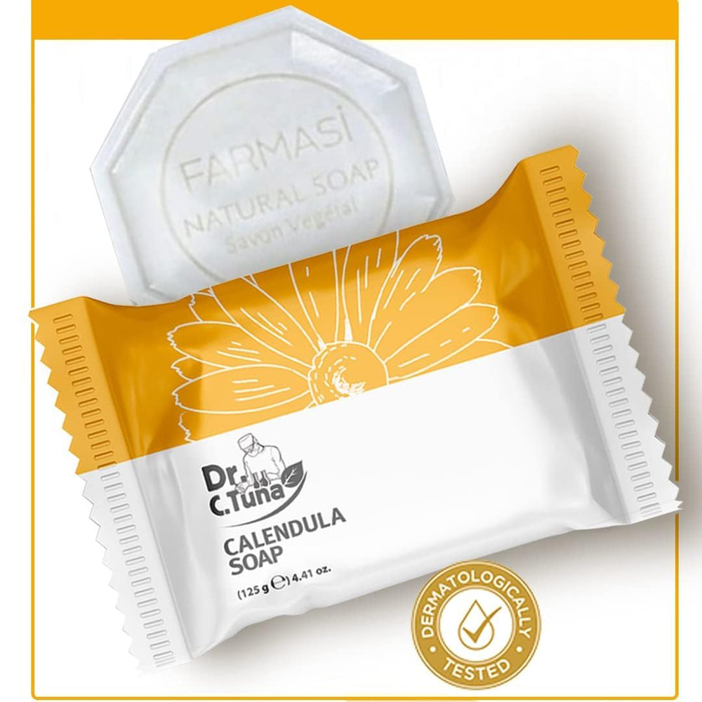 FARMASi calendula soap bar resting on a soap dish highlights natural ingredients.