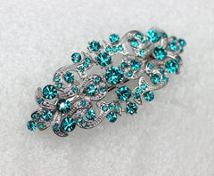 Faship Malibu blue-teal barrette suits wedding hairstyles beautifully.