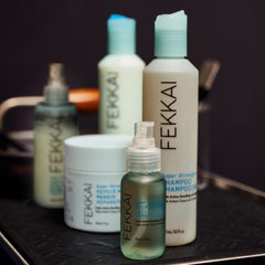Tonka bean and almond scent notes on FEKKAI conditioner closeup
