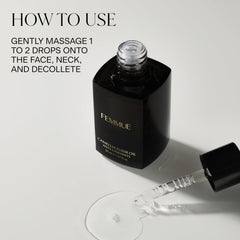 Gently applying FEMMUE Camellia Elixir to face for hydration