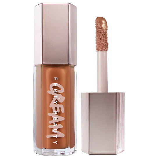 FENTY BEAUTY Gloss Bomb Cream Color Drip Honey Waffles swatch with creamy color and high shine.