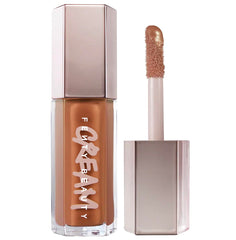 FENTY BEAUTY Gloss Bomb Cream Color Drip Honey Waffles swatch with creamy color and high shine.