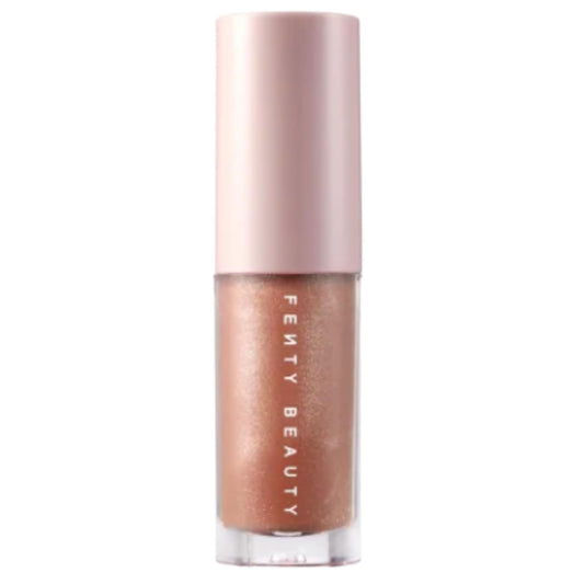 Fenty Beauty Gloss Bomb travel-size bottle for on-the-go shine.