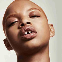 Close-up of warming plump sensation on lips.