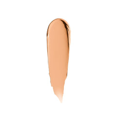 Fenty Eaze Drop Blur Stick application on face shows smooth blending.