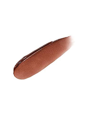 Fenty Beauty Slip Shine Bubble Rum on lips delivers a glossy glow.