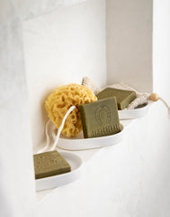 Fer à Cheval multi-use soap shown in kitchen and bathroom applications.