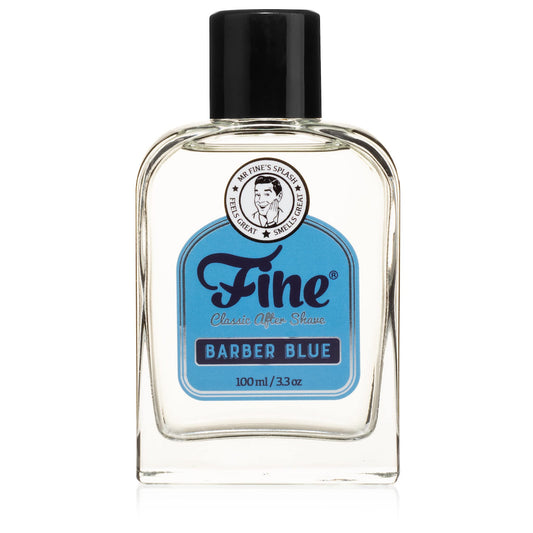 Fine men's aftershave bottle pour with Barber Blue scent, refreshing finish.