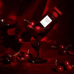 Fine'ry Cherry Almond EDP amaretto note closeup hints gourmand warmth.
