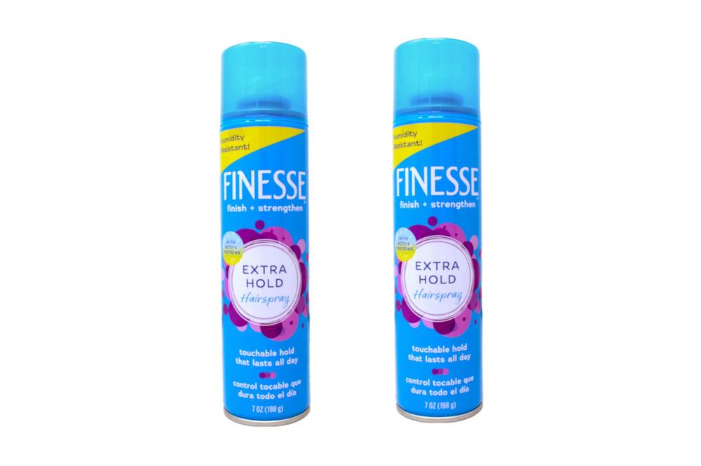 Finesse Extra Hold hairspray can close-up showing long-lasting control.