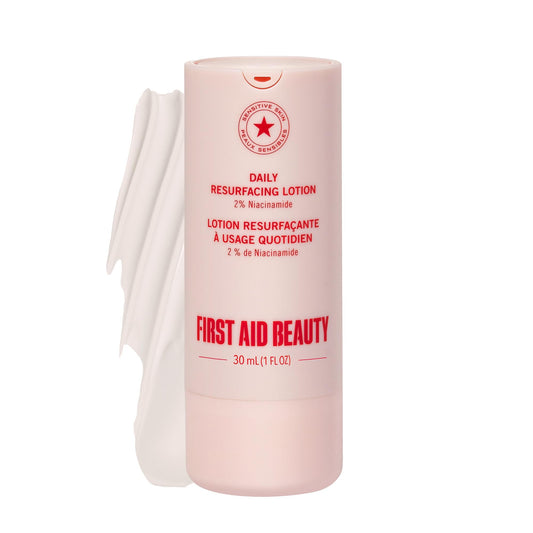 First Aid Beauty Lactic Acid Lotion bottle close-up showing nourishing hydration for acne-prone skin.