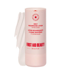 First Aid Beauty Lactic Acid Lotion bottle close-up showing nourishing hydration for acne-prone skin.