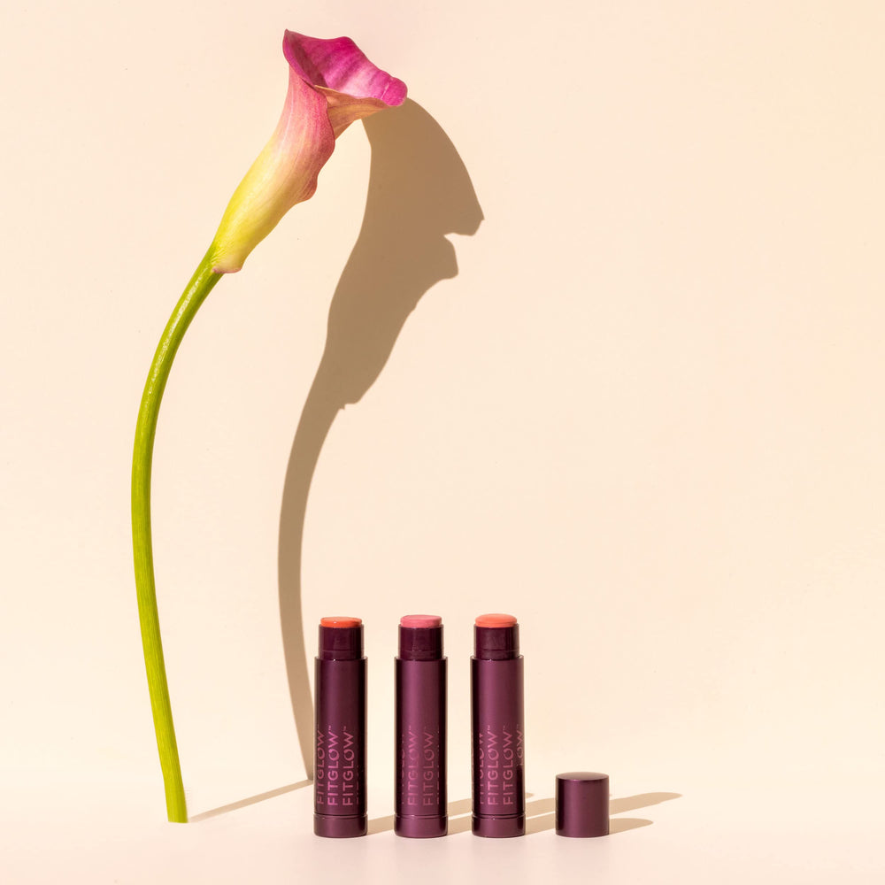Fitglow Cloud Collagen Lip/Balm compact shown for on-the-go hydration.
