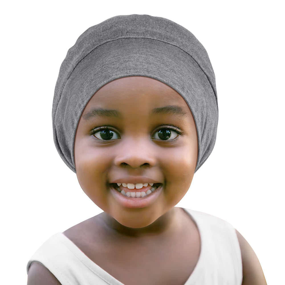 Fittia baby satin bonnet with adjustable strap securing overnight wear