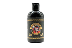Flagship Black Water Pomade bottle ready for matte, natural styling.
