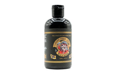 Flagship Black Water Pomade texture close-up shows flexible definition.