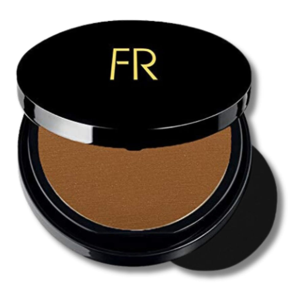 Close-up of Flori Roberts bronzer pan showing silky, blendable texture.