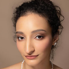 03 Classic Ballet petal pink shade flatters warm undertones.