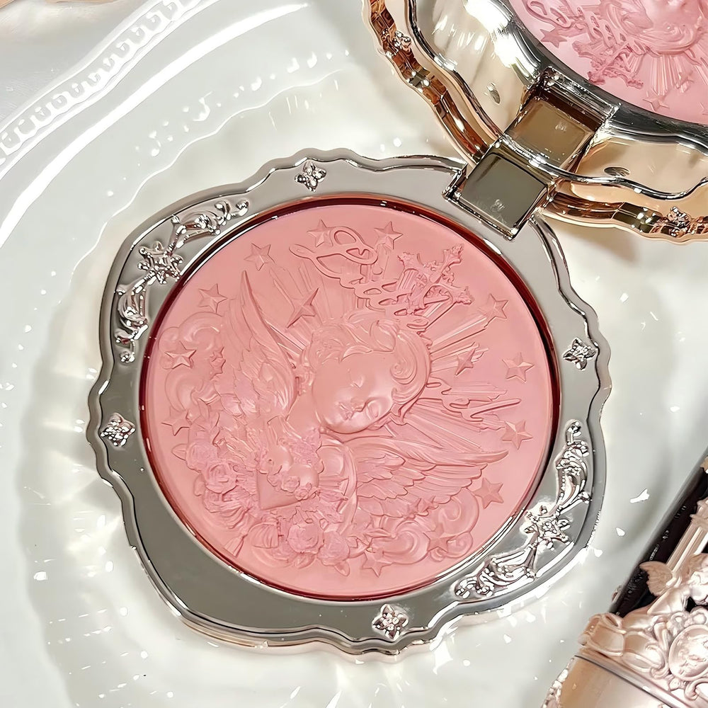 Flower Knows Little Angel Cream Blush swatch showing dewy, natural glow on skin.