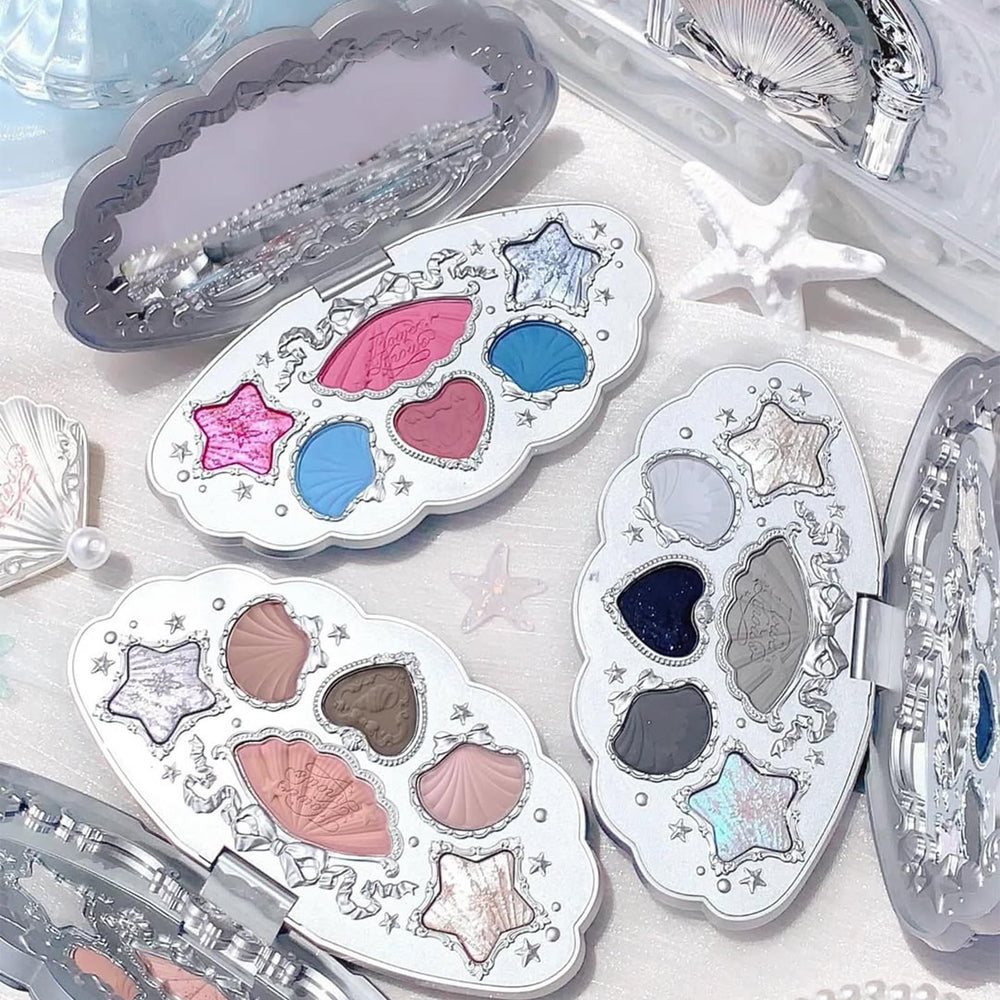 Flower Knows Shell's Jewel packaging features iridescent mother-of-pearl inlay.