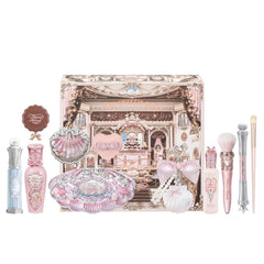 Flower Knows Shells Jewel Lip Glaze glistens for a polished lip finish.
