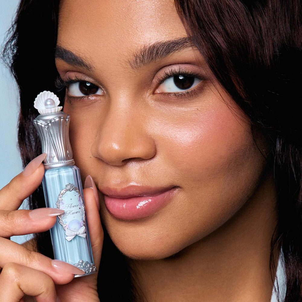 Flower Knows Shell's Jewel Lip Glaze bottle closeup emphasizes premium packaging.