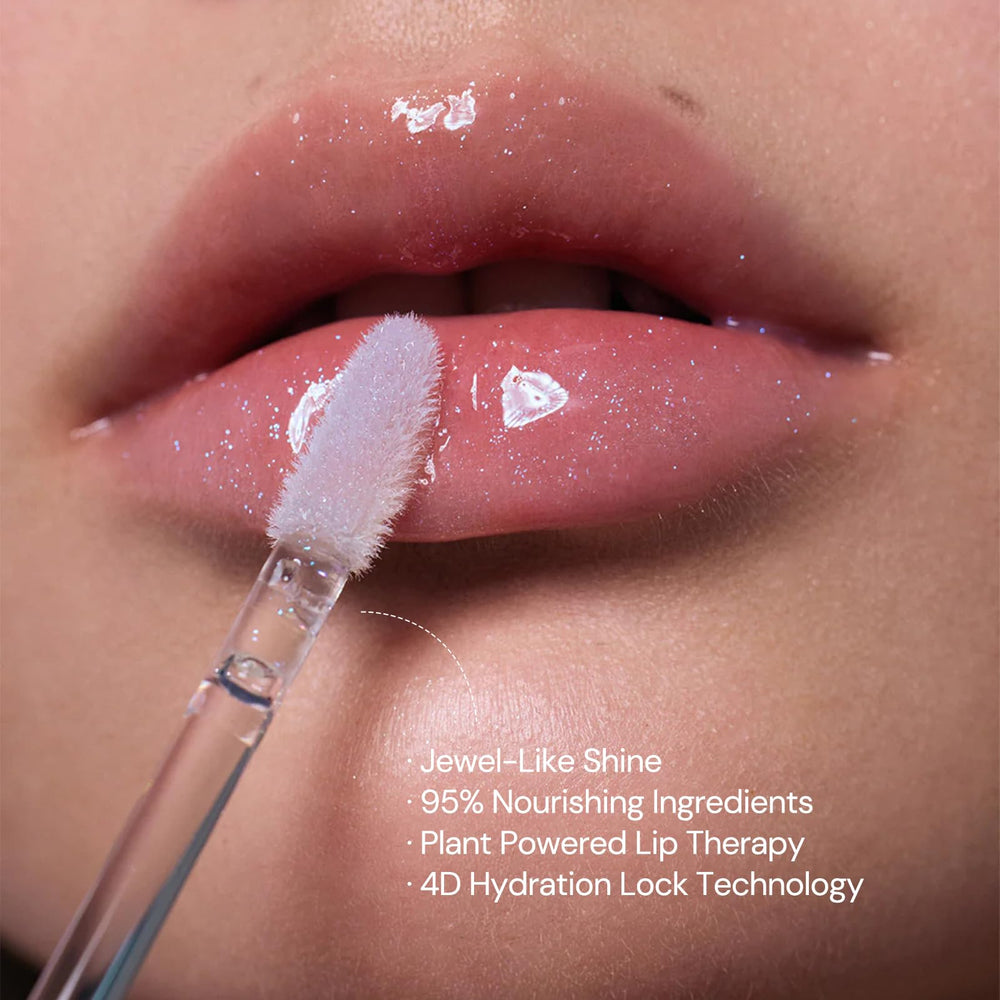 Flower Knows Lip Glaze in a glossy shot showing crystal-like shine
