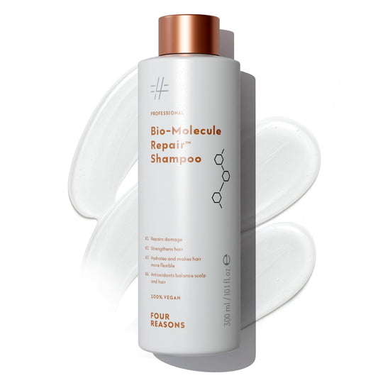 Four Reasons Bio-Molecule Bond Repair Shampoo bottle highlights color-treated hair moisture restoration.