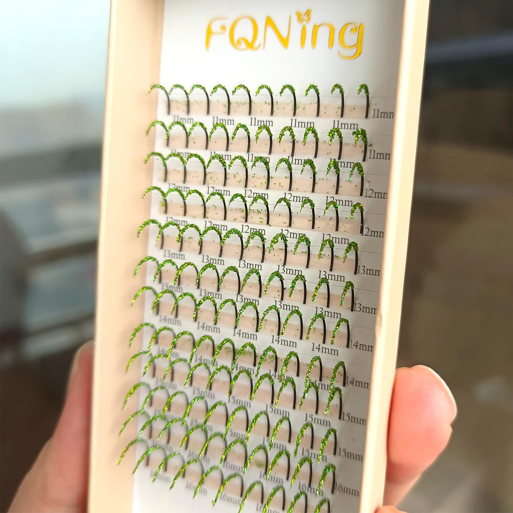 FQNing glitter lash extensions on tray with vibrant light green sparkle for party-ready eyes