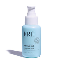 FRÉ Revive Me serum bottle close-up, showcasing a silky, lightweight texture.
