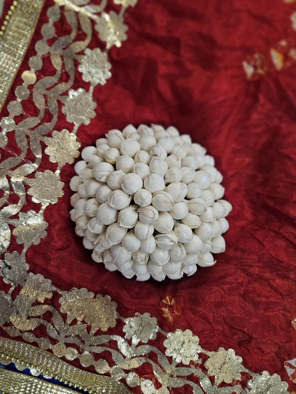 Gajra artificial flower for wedding accessory, secure fit for party wear.