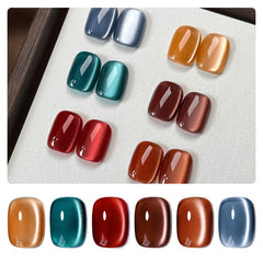 GAOY Silk Glitter Cat Eye Red gel creates shimmering lines for dramatic nails.