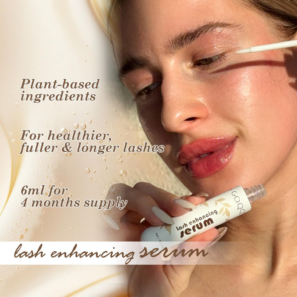 Close-up of GAQQI lash serum brush along the lash line for precise application.