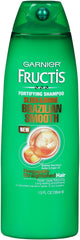 Garnier Fructis Brazilian Smooth Shampoo bottle signaling up to 10x smoother hair.