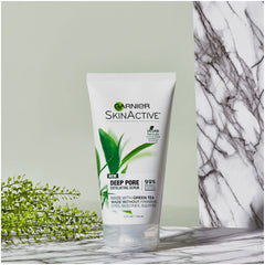 Pore-refinement texture shown on skin with Garnier scrub.