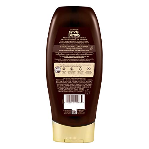 Garnier Whole Blends Ginger Recovery Conditioner label closeup highlights ginger and honey.