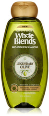 Garnier Whole Blends Legendary Olive shampoo bottle with nourishing formula for dry hair