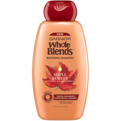 Garnier Whole Blends Maple Remedy conditioner bottle helps detangle and soften hair