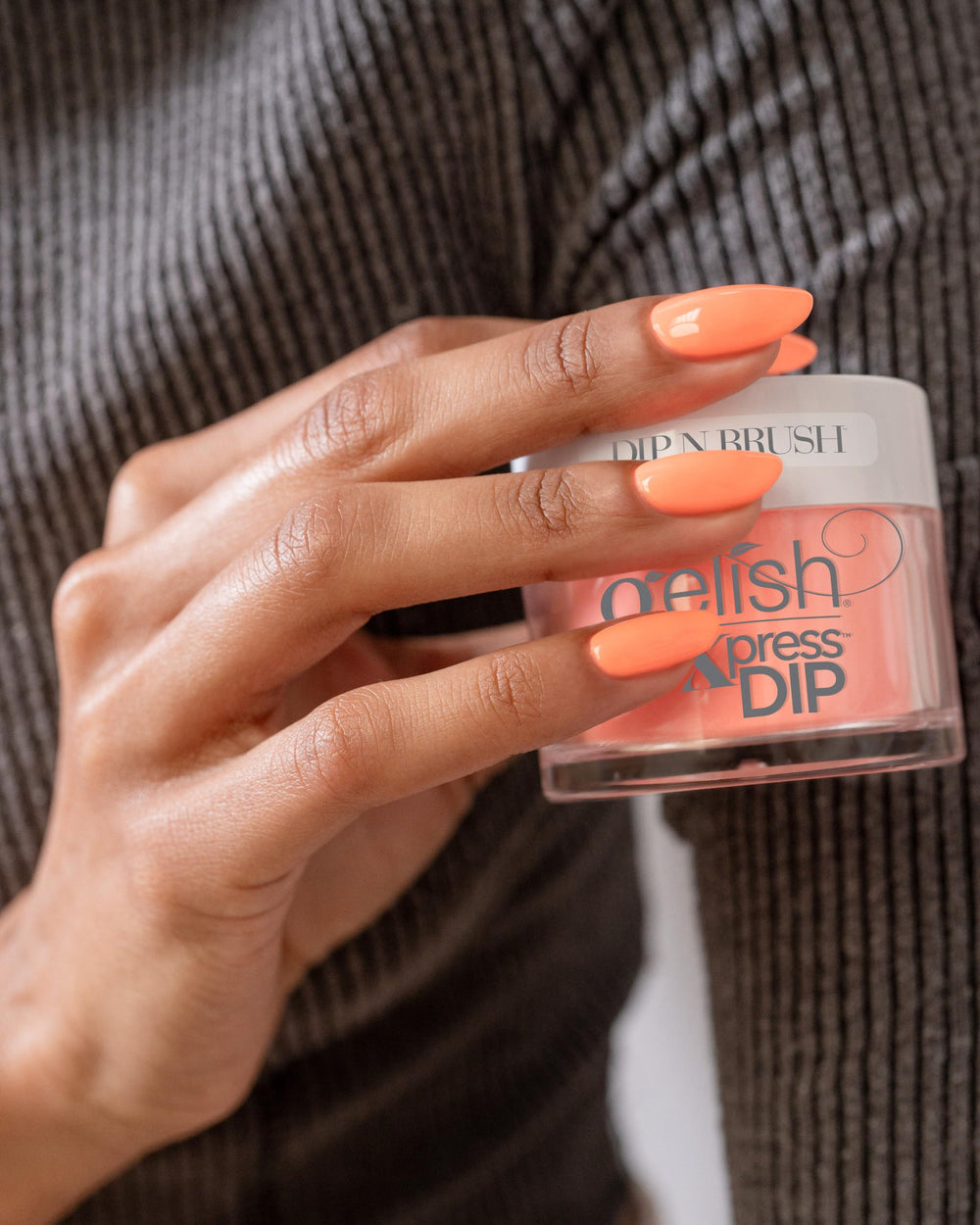 Gelish Brighter Than You collection bottle shows a vivid orange shade.