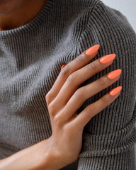 Gelish ColorFusion dip powder enables even coverage with controlled resin absorption.