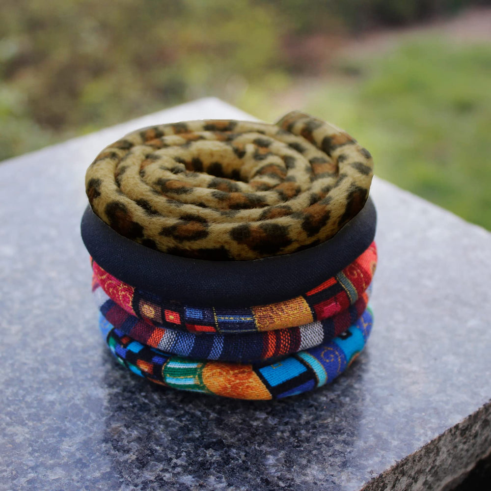 General 25-inch length wraps medium-thick dreads securely.