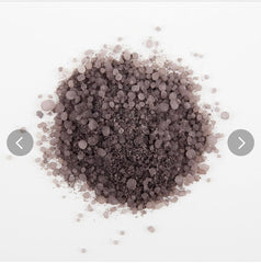 Generic bath salts dissolving in tub with orange scent, showing relaxing citrus benefit