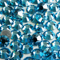 Genie Crystal nail art with Ice Aquamarine rhinestones for delicate accents.