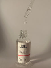 Geo Facial Serum 5-in-1 bottle closeup shows premium vitamin-rich formula