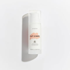 Georgiemane Curl Cream bottle for defined curls and moisture.