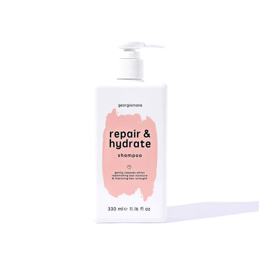 Georgiemane Repair and Hydrate Shampoo bottle displays color-safe nourishment.