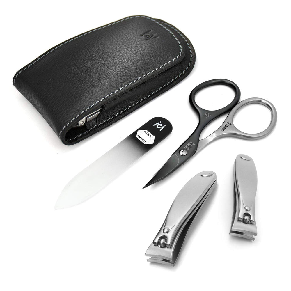 GERMANIKURE 4pc set in leather case for organized travel grooming.