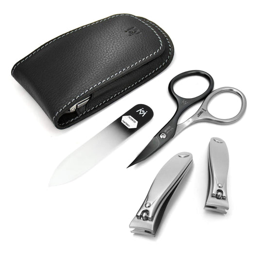 GERMANIKURE 4pc set in leather case for organized travel grooming.