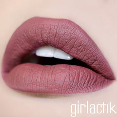 Closeup of Girlactik Allure Lip Paint tube showing pigment-rich color
